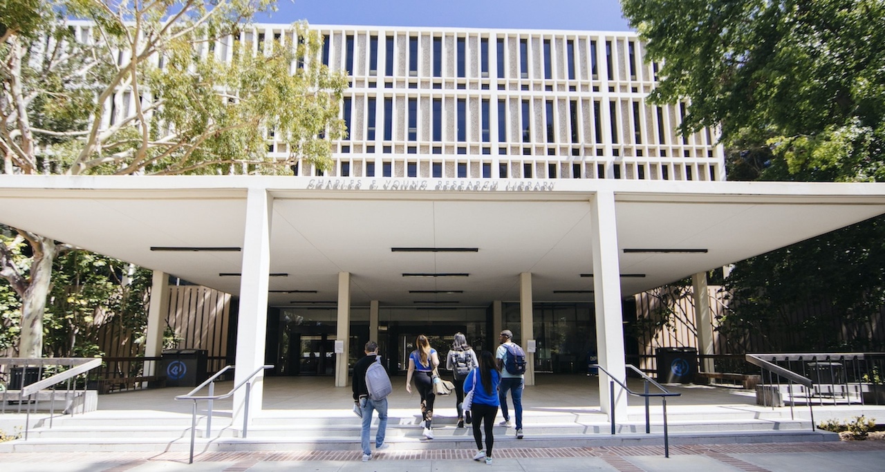 Students walking into the Young Research Library