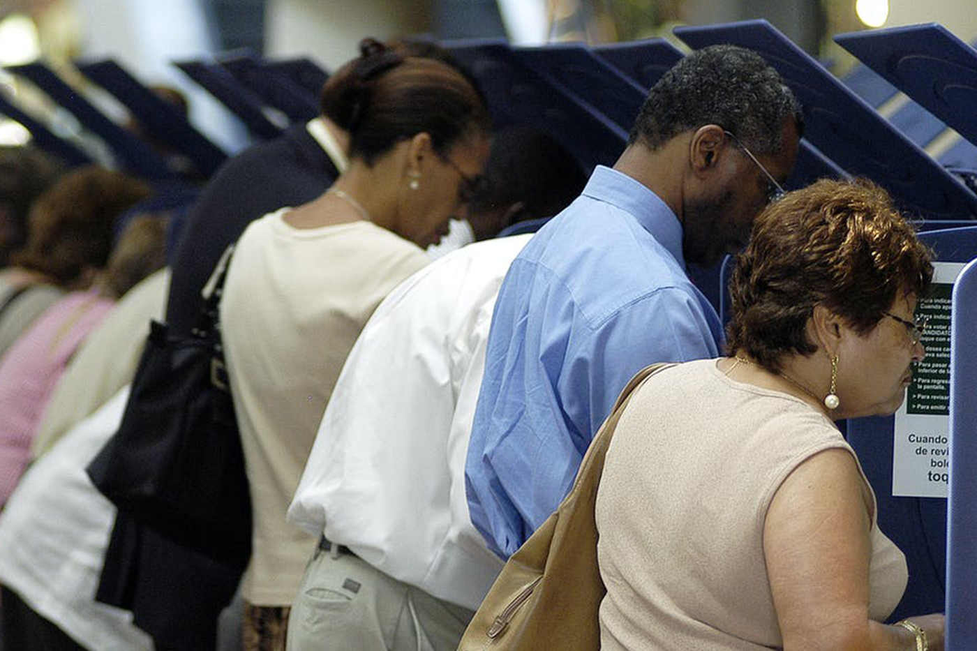 People at the voting polls voting