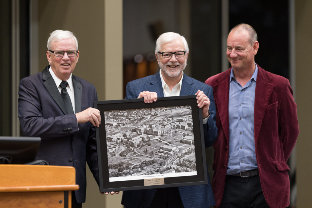 Glen Tom John Agnew receiving an award