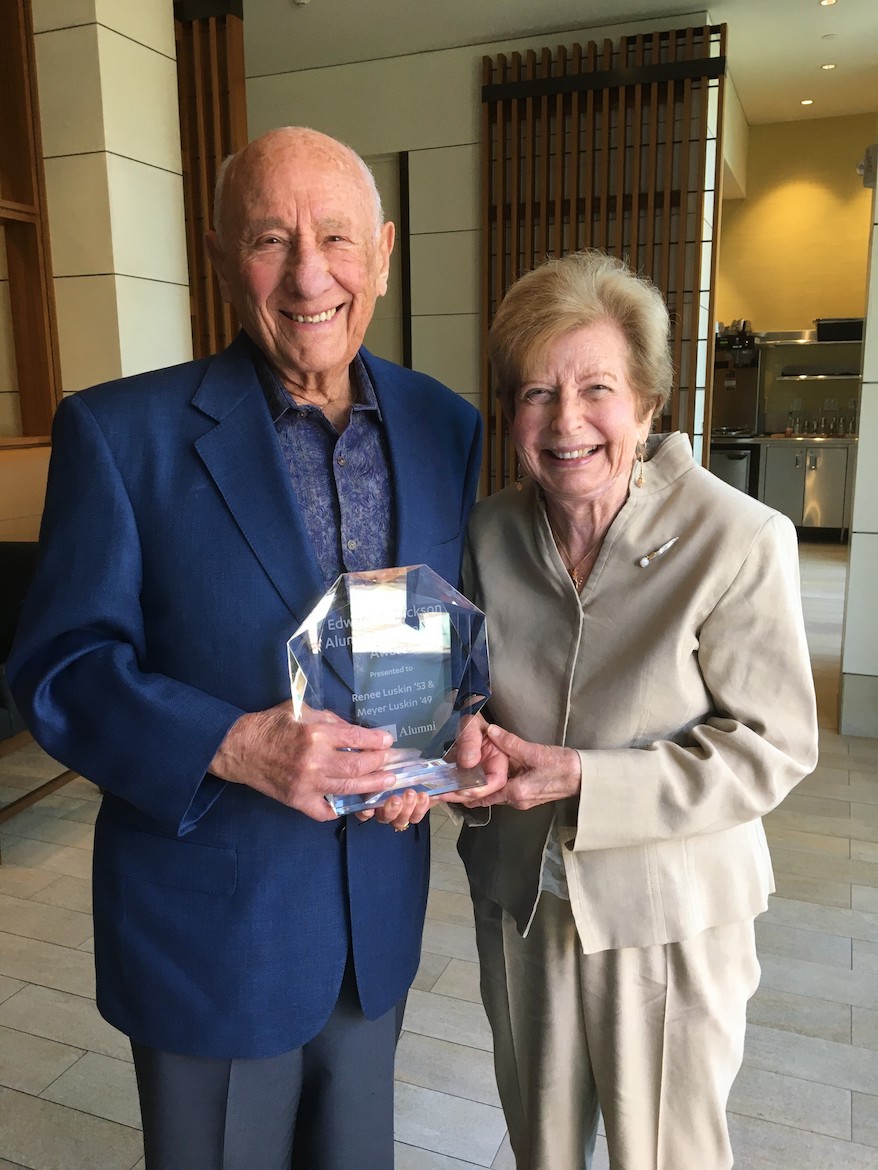 Meyer and Renee Luskin receiving the 2021 Edward A. Dickson Alumni of the Year Award